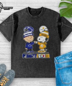Pretty Charlie Brown fist bump with Snoopy against Pennsylvania city skyline, featuring Nittany Lions and Steelers logos.
