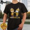 Pretty Charlie Brown fist bump with Snoopy on a Pittsburgh Steelers X Penguins T-shirt, perfect for sports fans.