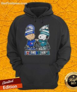 Alt Text: Pretty Charlie Brown fist bump with Snoopy wearing Philadelphia sports hoodie featuring 76ers and Eagles skyline.