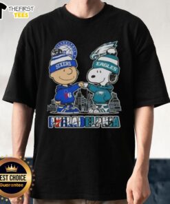 Pretty Charlie Brown and Snoopy fist bump in Philadelphia skyline t-shirt featuring 76ers and Eagles sports themes.