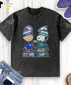 Pretty Charlie Brown fist bump with Snoopy against Philadelphia skyline, featuring 76ers and Eagles, on a washed t-shirt.
