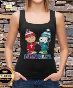 Pretty Charlie Brown fist bump with Snoopy on a Philadelphia City Sports tank top featuring Phillies and Eagles logos.
