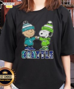 Pretty Charlie Brown fist bump with Snoopy, representing Seattle sports pride for Mariners and Seahawks on ladies tee.