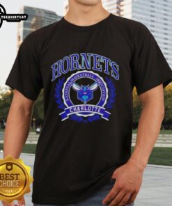 Charlotte Hornets NBA crest T-shirt featuring vibrant design and team colors, perfect for basketball fans and team spirit.
