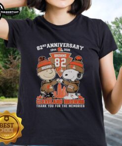 Alt Text: Stylish Cleveland Browns outfit featuring Snoopy and Charlie Brown tee, celebrating their 82nd anniversary (1944-2026).