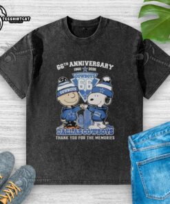 Alt Text: Stylish Dallas Cowboys outfit featuring Snoopy and Charlie Brown 66th Anniversary washed t-shirt, perfect for fans.