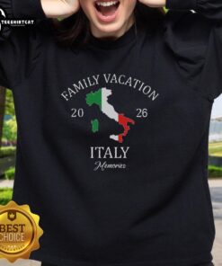 Happy family wearing matching sweatshirts on vacation in Italy 2026, showcasing their Family Travel Squad spirit.