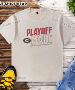 Alt Text: Pretty Georgia Bulldogs CFP 2025-2026 Playoff Mode logo on a washed t-shirt, perfect for fans and game days.