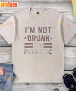 Patriotic washed t-shirt with 'Pretty I'm Not Drunk I'm Patriotic' text, perfect for Fourth of July celebrations.