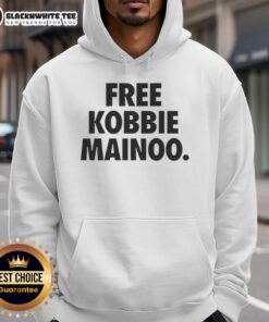 Pretty Man United's Kobbie Mainoo's brother wearing a stylish Free Kobbie Mainoo hoodie, showcasing team spirit.