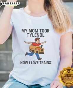 Funny meme featuring a woman in a tee shirt saying 'My mom took Tylenol, now I love trains' for train enthusiasts.