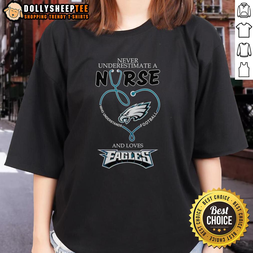 Pretty Never Underestimate A Nurse Who Understands Football And Loves Philadelphia Eagles Heart Ladies-Tee Pretty nurse in Philadelphia Eagles tee, showcasing love for football and healthcare, inspiring confidence and pride.