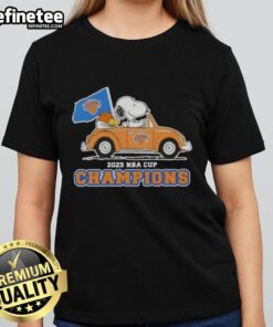 Pretty Peanuts Snoopy driving car in New York Knicks ladies tee celebrating 2025 NBA Cup Champions.