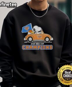 Alt Text: Pretty Peanuts Snoopy driving a car on a New York Knicks sweatshirt celebrating 2025 NBA Cup Champions.