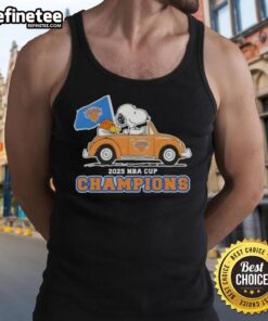 Alt Text: Snoopy driving a car in a Pretty Peanuts tank top celebrating the 2025 NBA Cup Champions, New York Knicks.