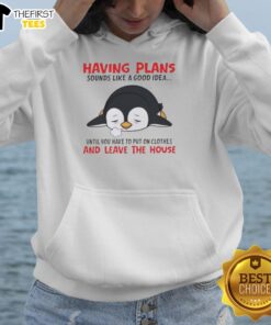 Cozy hoodie featuring a cute penguin design with text about plans, perfect for staying warm indoors or out.