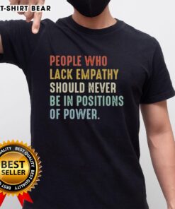 Stylish t-shirt featuring the phrase 'Pretty People Who Lack Empathy Should Never Be In Positions Of Power' in bold print.