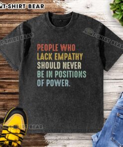 Pretty people wearing 'Empathy-less Power' t-shirt, highlighting the importance of empathy in leadership roles.