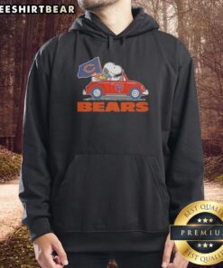 Pretty Snoopy and Woodstock in Chicago Bears football hoodie, riding on a car, showcasing team spirit and fun.