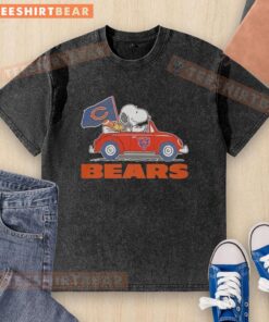 Pretty Snoopy and Woodstock riding in a Chicago Bears football car on a washed t-shirt, perfect for fans.