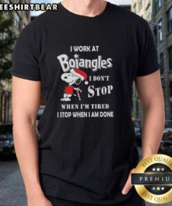 Alt Text: Pretty Snoopy Christmas T-Shirt with 'I Work At Bojangles I Dont Stop When Im Tired' slogan.