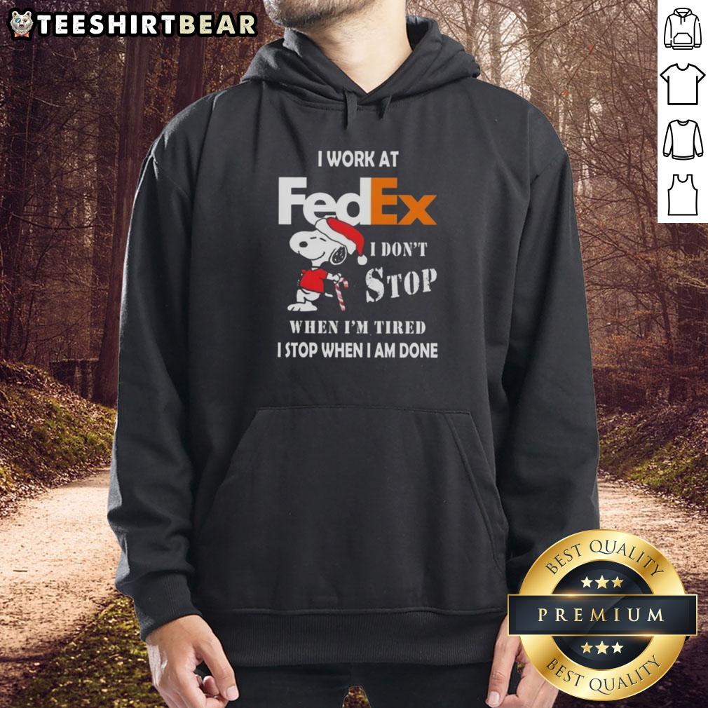 pretty-snoopy-i-work-at-fedex-i-dont-stop-when-im-tired-i-stop-when-i-am-done-christmas-hoodie Alt Text: Pretty Snoopy Christmas hoodie with 'I work at FedEx, I don't stop when I'm tired, I stop when I'm done' text.