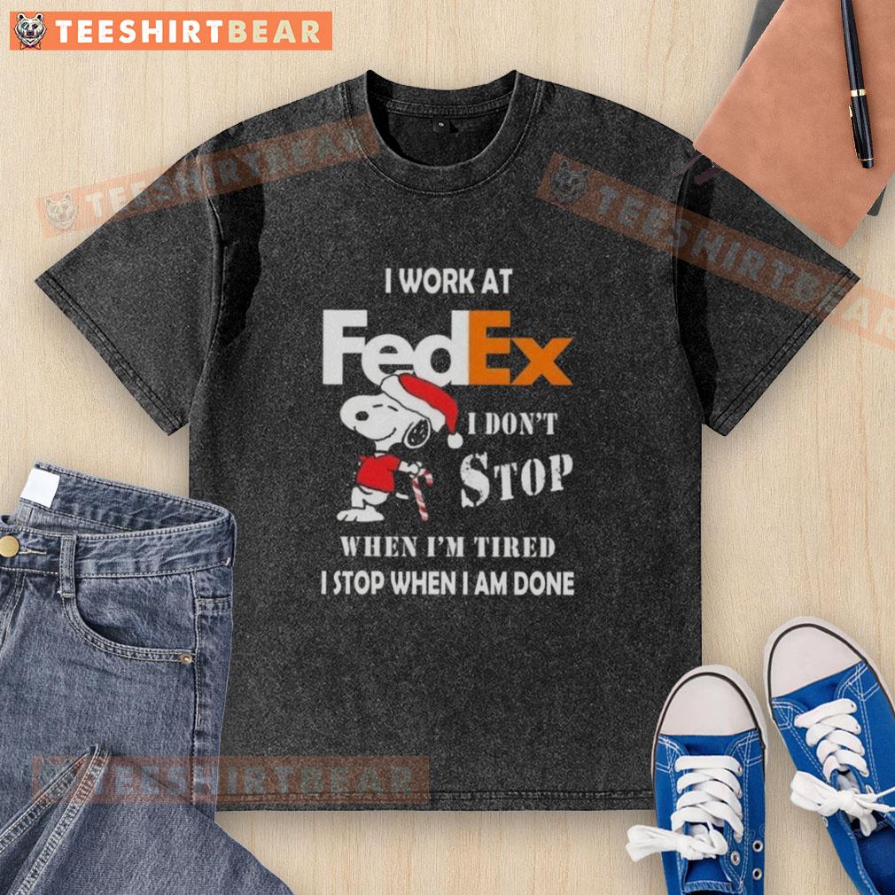 pretty-snoopy-i-work-at-fedex-i-dont-stop-when-im-tired-i-stop-when-i-am-done-christmas-washed-t-shirt Alt Text: Cute Snoopy graphic on a Christmas-themed washed t-shirt for FedEx, featuring the quote about hard work and dedication.