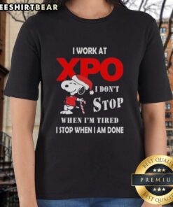 Pretty Snoopy Christmas tee for ladies saying 'I work at XPO, I don't stop when I'm tired, I stop when I'm done.'