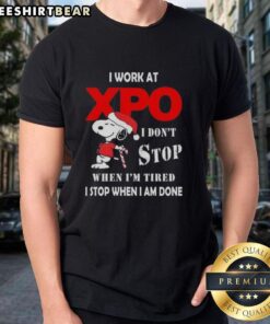 Alt Text: Pretty Snoopy Christmas T-Shirt with 'I Work At Xpo I Dont Stop When Im Tired I Stop When I Am Done' quote.