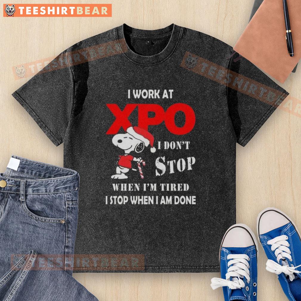 pretty-snoopy-i-work-at-xpo-i-dont-stop-when-im-tired-i-stop-when-i-am-done-christmas-washed-t-shirt Alt Text: Cute Snoopy graphic on a Christmas-themed washed t-shirt, featuring 'I work at XPO, I don't stop when I'm tired.'