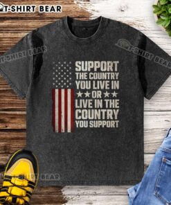 Stylish flag-washed t-shirt featuring 'Support The Country You Live In' design, perfect for patriotic fashion lovers.