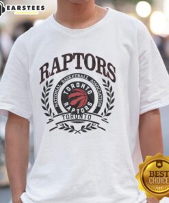 Alt Text: Retro Toronto Raptors NBA logo with laurel wreath frame on a stylish t-shirt design for basketball fans.