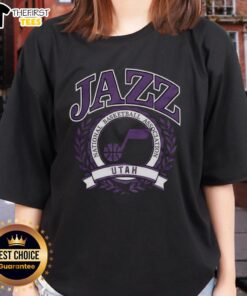 Alt Text: Retro Utah Jazz NBA logo with laurel wreath frame on a stylish ladies tee, perfect for basketball fans.