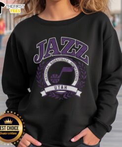 Alt Text: Retro Utah Jazz NBA logo sweatshirt with laurel wreath frame, perfect for basketball fans and vintage sportswear lovers.