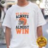 Funny football fan t-shirt featuring 'Pretty We Almost Always Almost Win' slogan, perfect for game day enthusiasm.