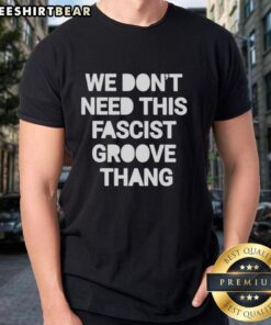 Alt Text: Pretty We Don't Need This Fascist Groove Thang T-Shirt featuring bold text and vibrant colors, perfect for statement fashion.