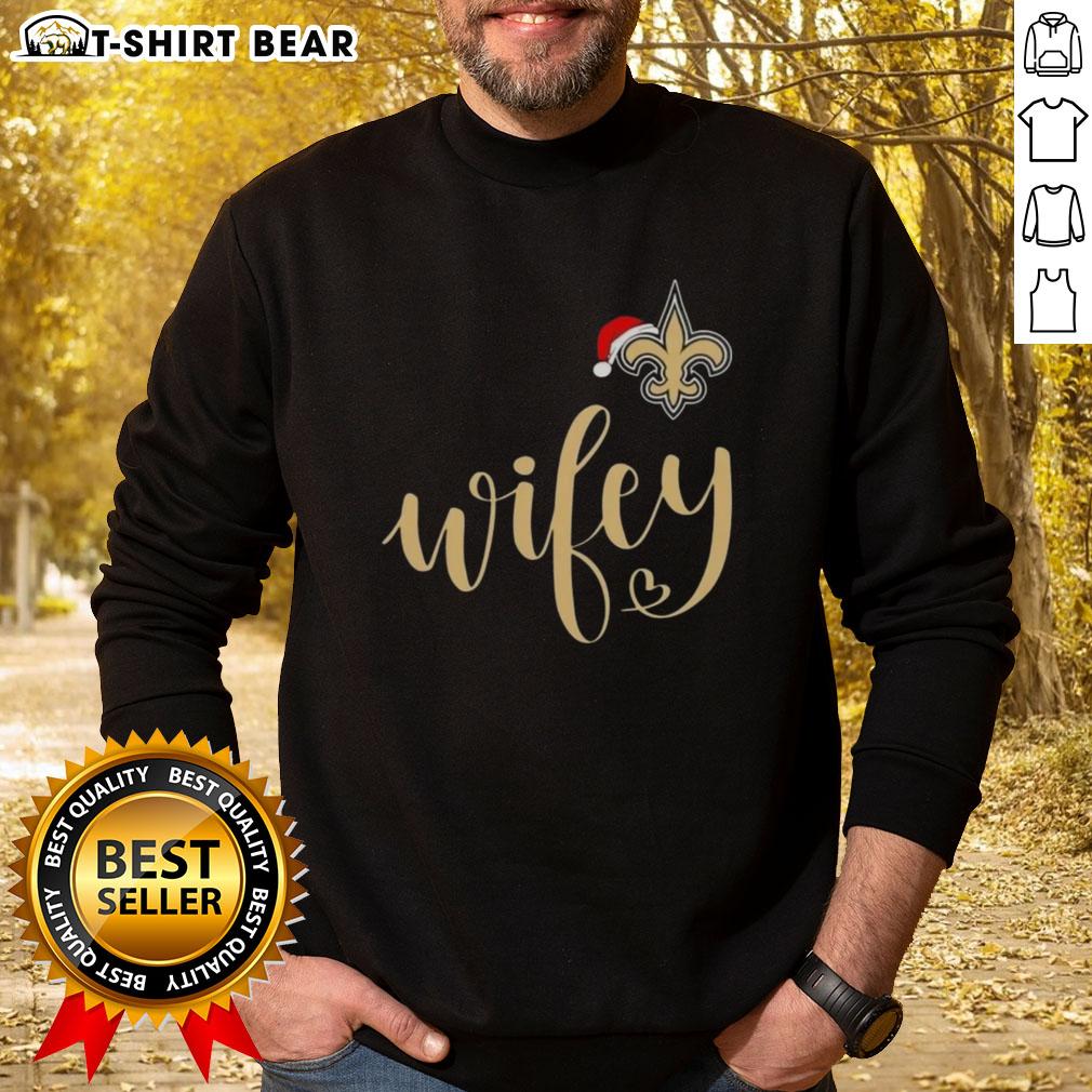 Pretty Wifey New Orleans Saints Santa Hat Merry Christmas Sweatshirt Pretty Wifey New Orleans Saints Santa Hat Merry Christmas Sweatshirt, perfect for holiday game day celebrations.