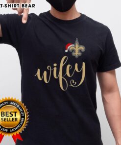 Pretty Wifey New Orleans Saints Santa Hat Merry Christmas T-Shirt featuring festive design and team colors for holiday cheer.