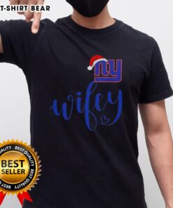 Alt Text: Pretty Wifey New York Giants Santa Hat Merry Christmas T-Shirt featuring festive design for holiday football fans.