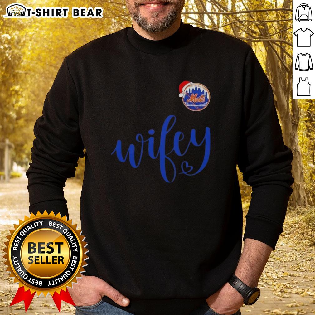 Pretty Wifey New York Mets Santa Hat Merry Christmas Sweatshirt Pretty Wifey New York Mets Santa Hat Merry Christmas Sweatshirt featuring festive design and team logo for holiday cheer.