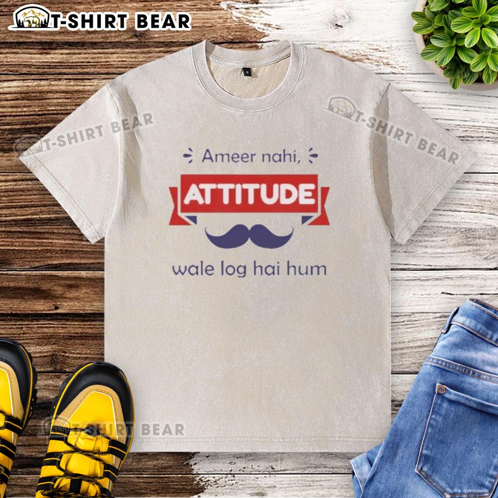 Top Ameer Nahi Attitude Wale Log Hai Hum Washed T Shirt Top Ameer Nahi Attitude Wale Log Hai Hum washed t-shirt featuring bold graphic print and a casual fit.