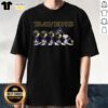 Top Baltimore Ravens X Peanuts Snoopy and Friends Abbey Road T-Shirt featuring iconic characters in a fun football design.