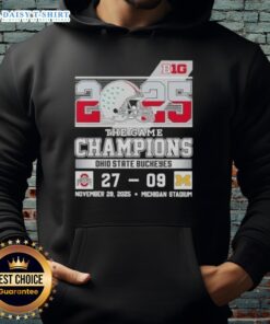 Alt Text: Ohio State Buckeyes hoodie celebrating Top Big Ten The Game champions at Michigan Stadium.