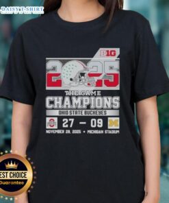 Ohio State Buckeyes champions celebrate at Michigan Stadium in a stylish ladies tee after winning The Game.