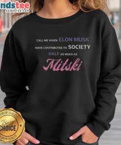 Top Call Me When Elon Musk Has Contributed To Society Half As Much As Mitski Sweatshirt in a stylish urban setting.