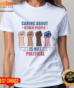 Alt Text: Top Caring About Other People Is Not Political Fists Ladies Tee showcasing a bold design for compassionate women.