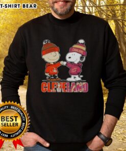 Top Charlie Brown and Snoopy Cleveland City Sports sweatshirt featuring Browns and Cavaliers logos, perfect for fans.