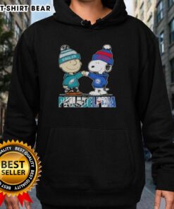 Top Charlie Brown and Snoopy hoodie featuring Philadelphia Eagles and 76ers, perfect for sports fans in Philly.
