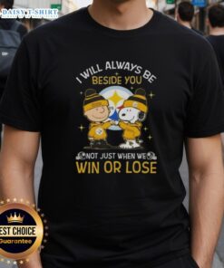 Alt Text: Top Charlie Brown and Snoopy Pittsburgh Steelers T-shirt with 'I Will Always Be Beside You' slogan.