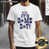 Alt Text: Top DC4L It's Game Day Dallas Cowboys Logo T-Shirt featuring vibrant team colors and iconic Cowboys logo design.